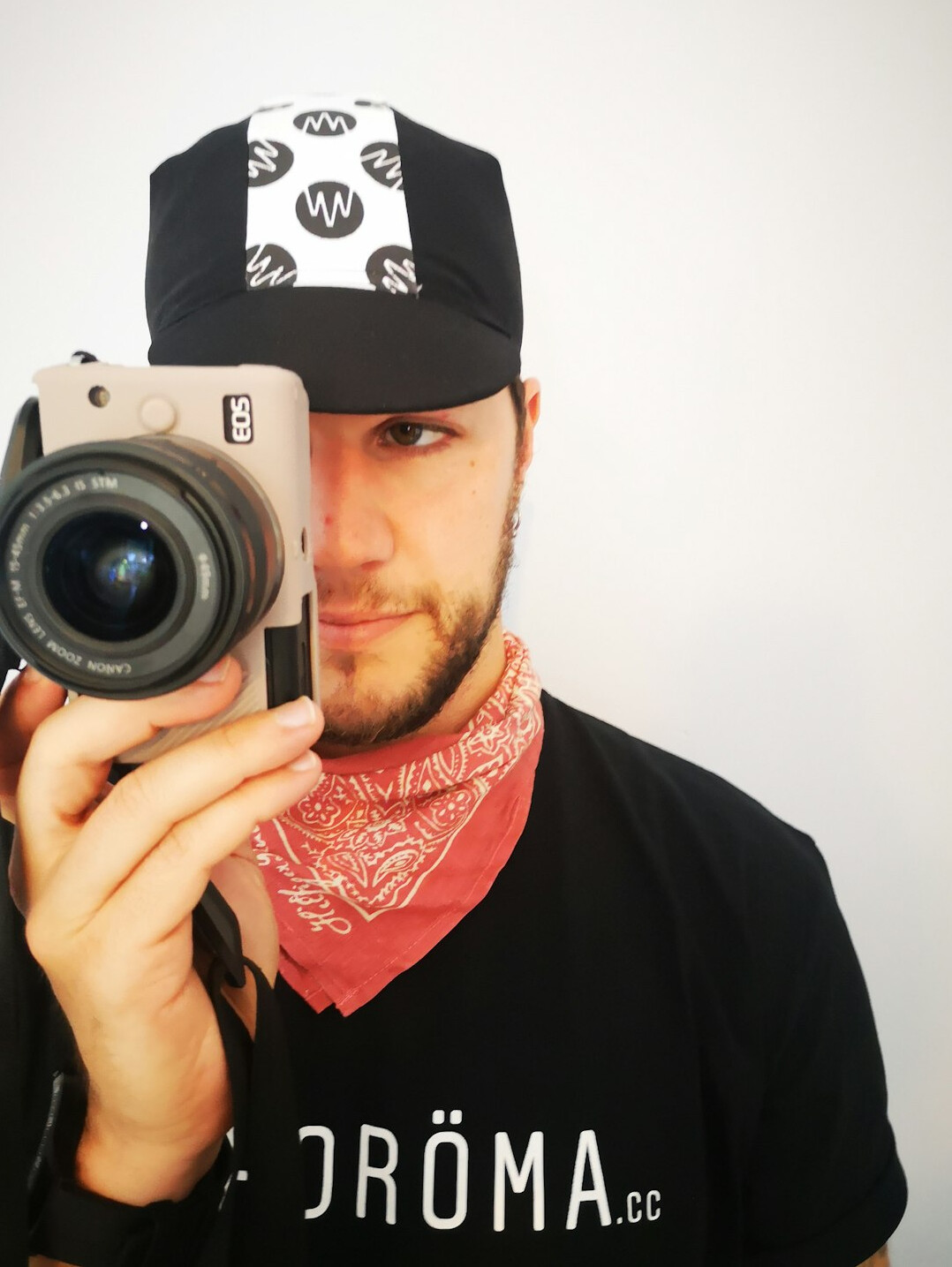 Portrait of a Polish-origin man camera operator with a beard